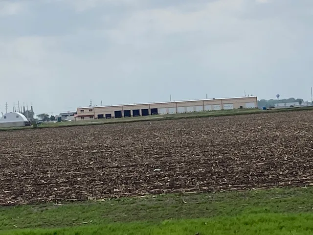 a view of a lake with a big yard