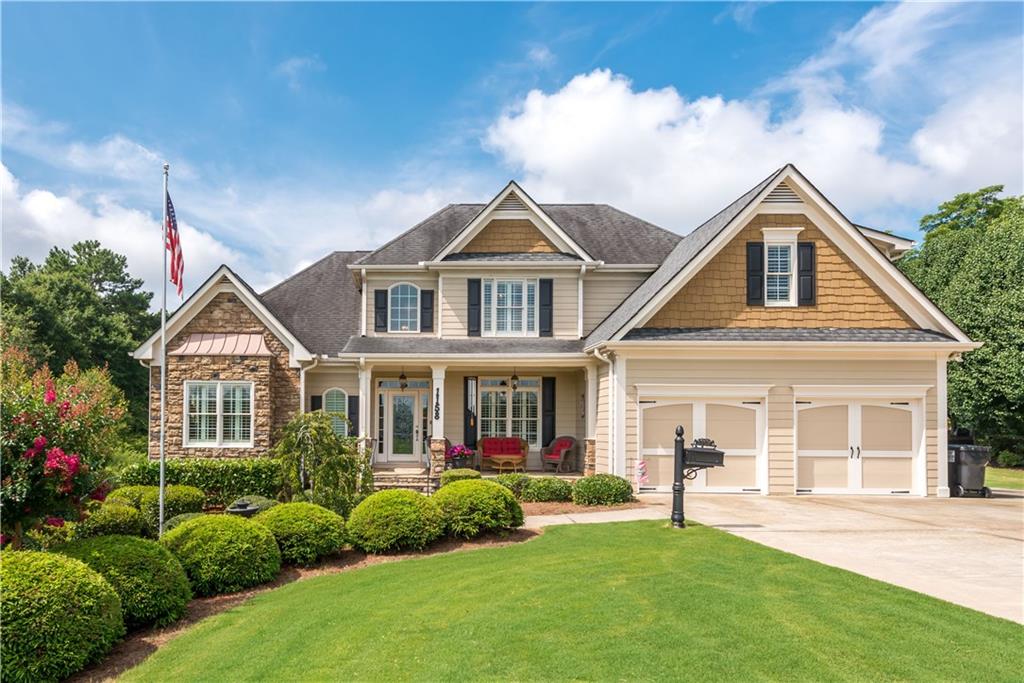 1158 Bart Manous Road Canton, GA 30115 - Photo 1 of 1 front view of a house with a yard