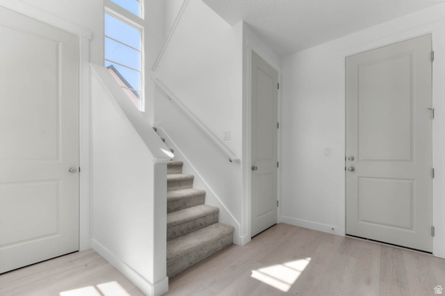 3204 West 1570 North Provo, UT 84601 - Photo 7 of 19 Staircase featuring wood finished floors
