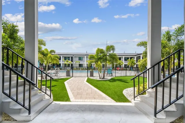 a view of outdoor space yard swimming pool and porch