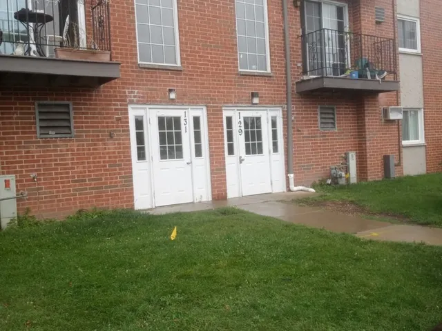 a backyard of a house with lots of green space