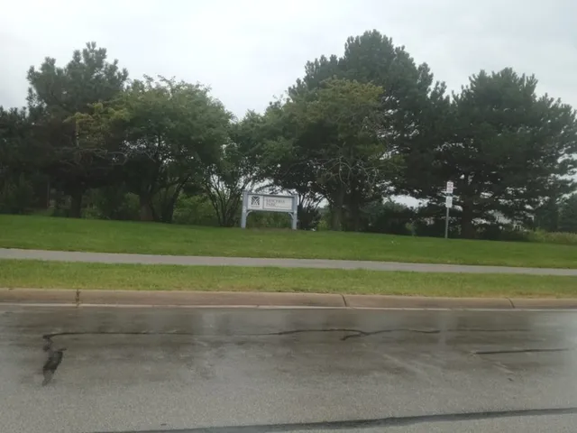 a view of building with yard