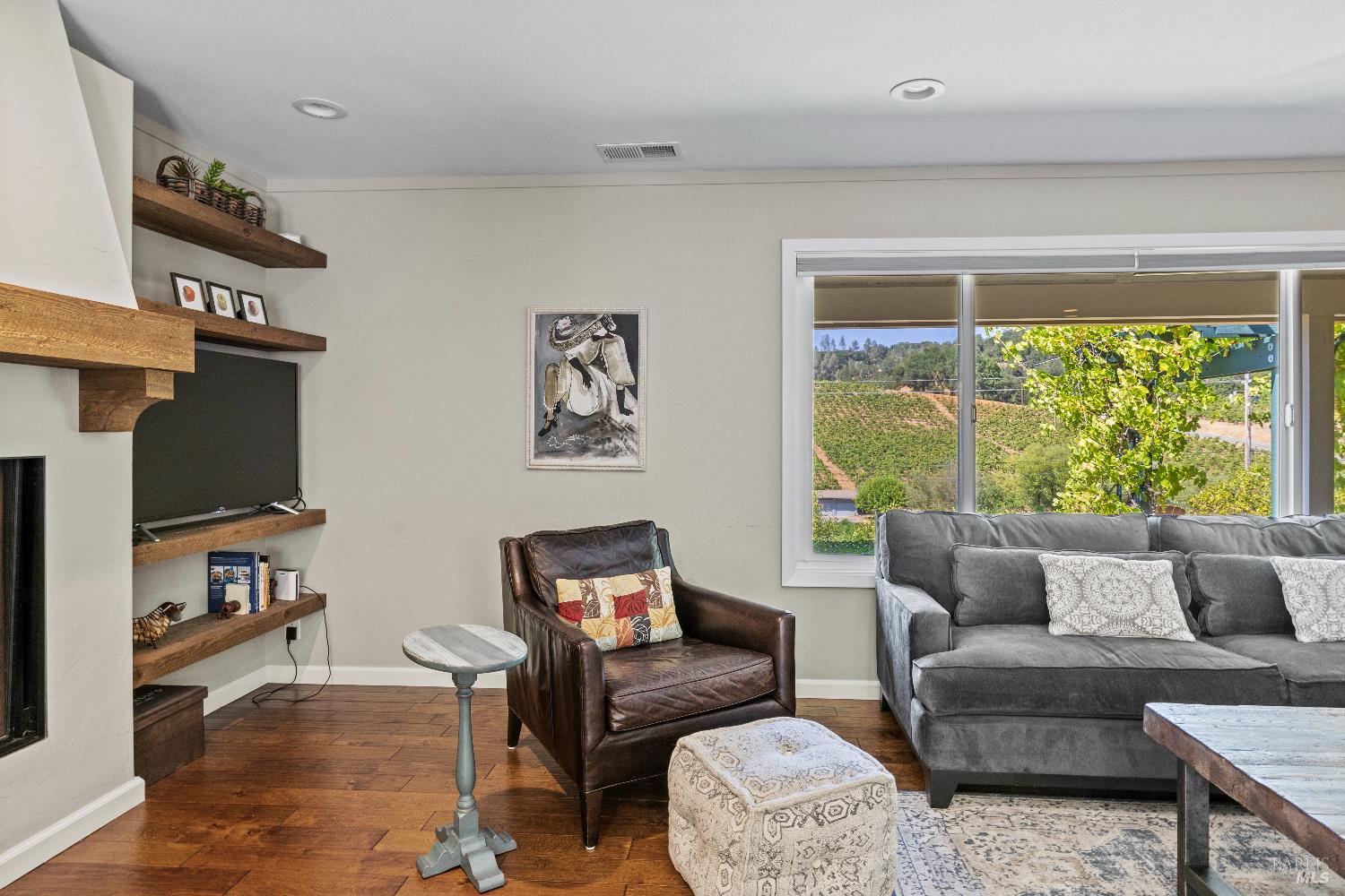 1389 Canyon Road Geyserville, CA 95441 - Photo 20 of 59 a living room with furniture and a flat screen tv