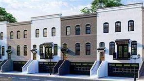 a front view of a building with many windows