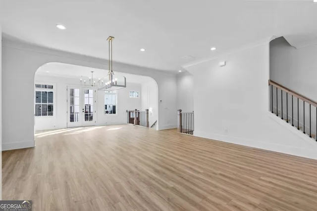 a view of balcony with wooden floor