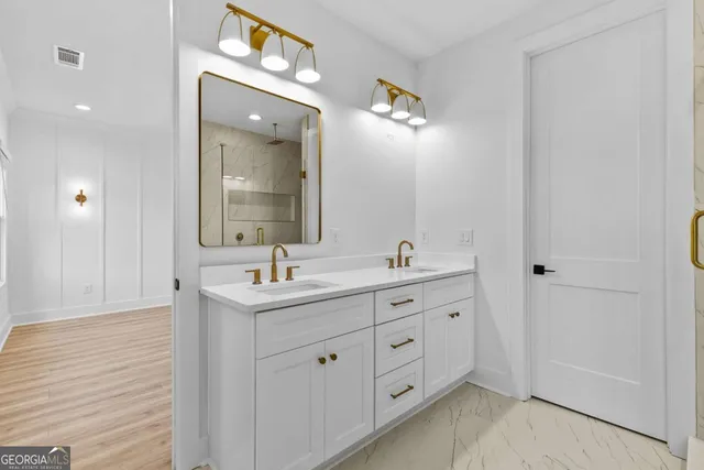 a bathroom with a bathtub and shower