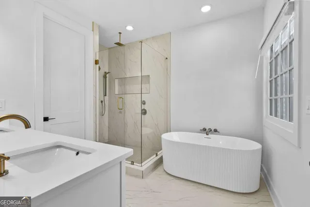 a view of a kitchen from the hallway