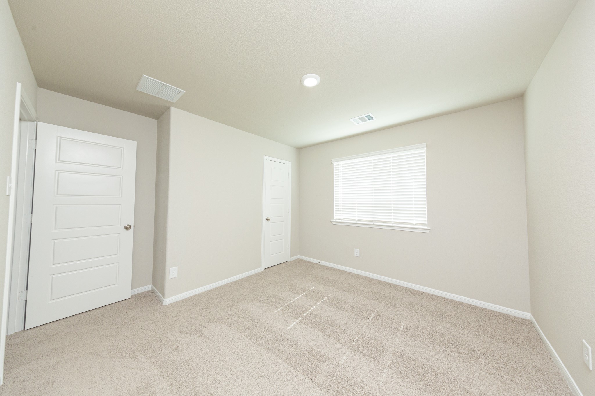 9258 Grace Rdg Drive Willis, TX 77318 - Photo 17 of 24 an empty room with windows