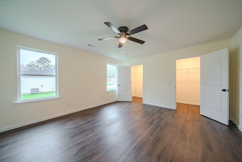 4410 Forrest Road Columbus, GA 31907 - Photo 15 of 30 a view of an empty room with wooden floor and a window