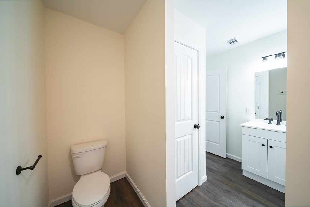 4410 Forrest Road Columbus, GA 31907 - Photo 21 of 30 a bathroom with a toilet a sink and shower