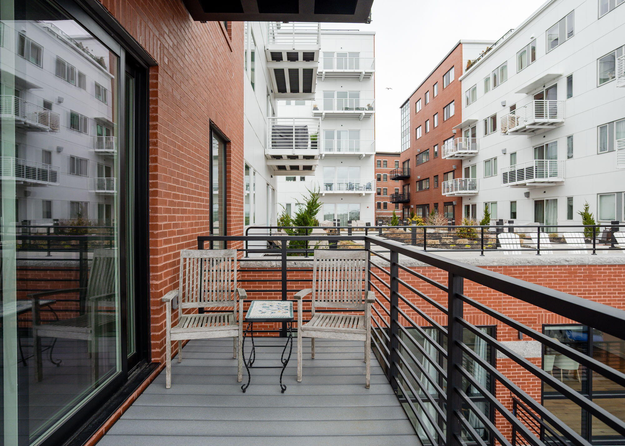 387 Commercial Street, Unit 322 Portland, ME 04101 - Photo 23 of 37 Private balcony with water views