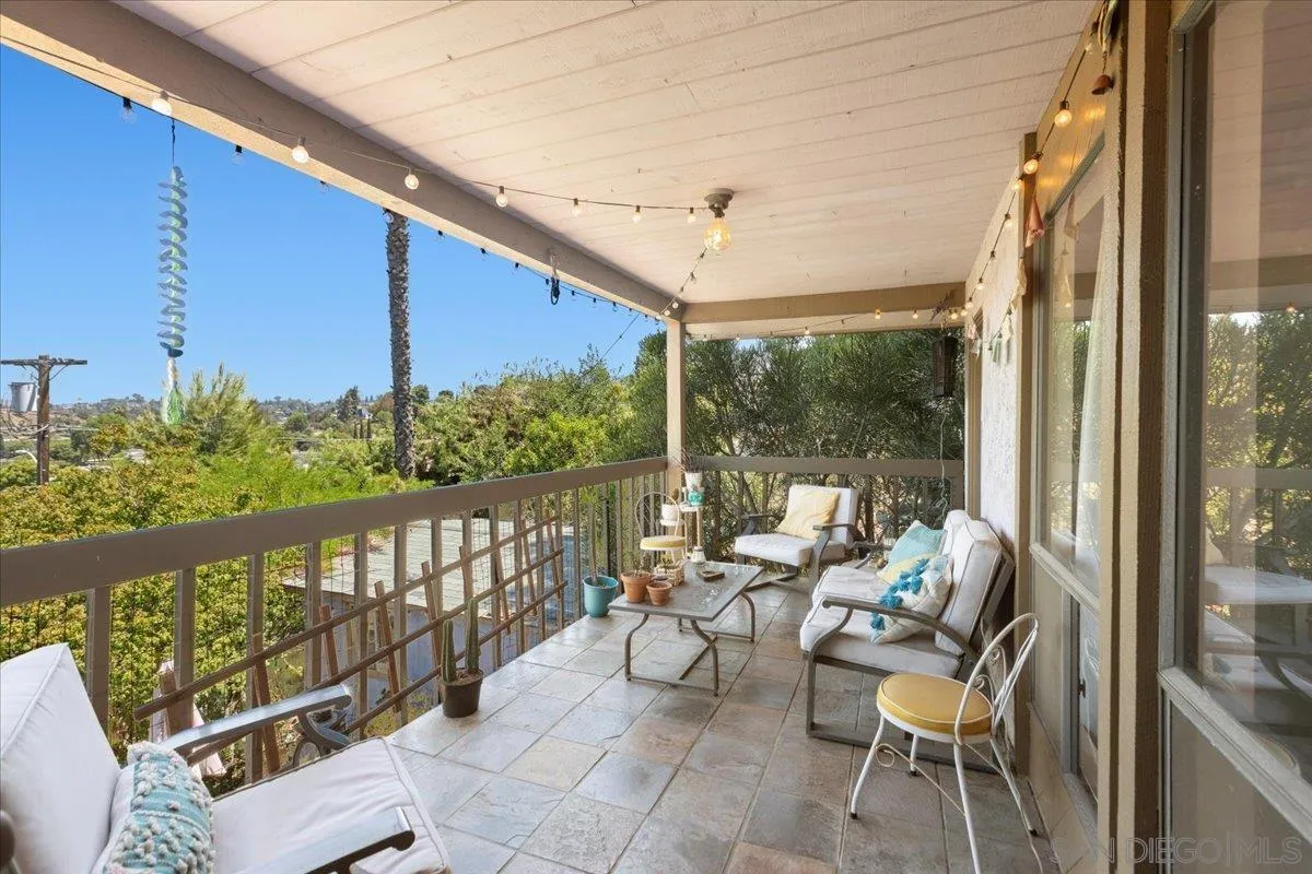 8621 Golf Drive Spring Valley, CA 91977 - Photo 17 of 41 a balcony with chairs and city view
