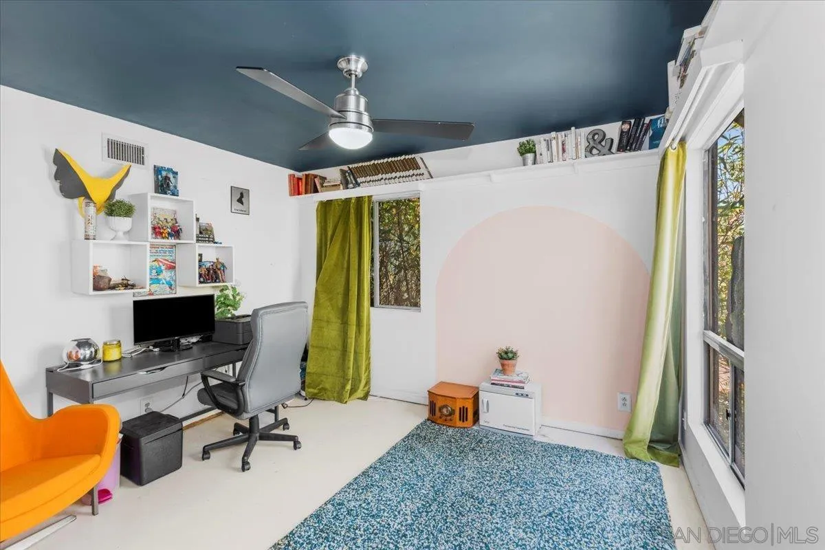 8621 Golf Drive Spring Valley, CA 91977 - Photo 29 of 41 a view of a workspace with furniture and a window