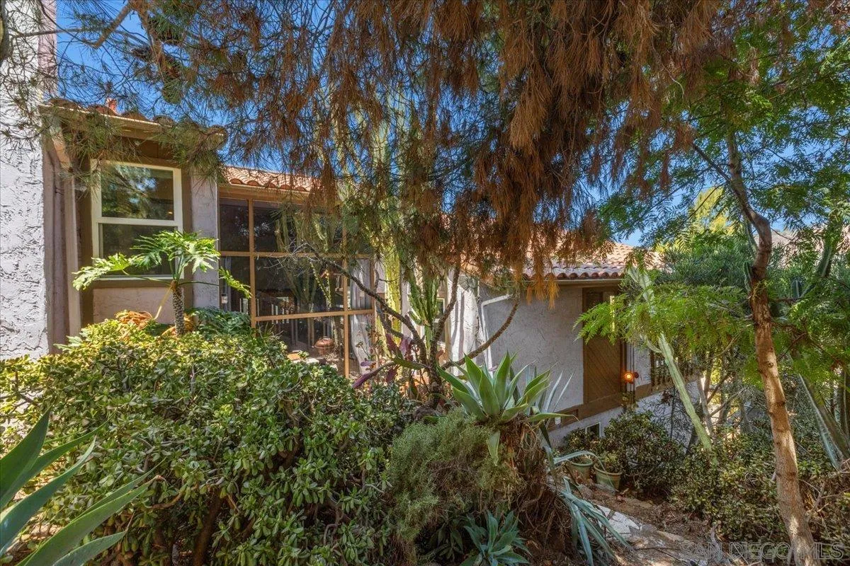 8621 Golf Drive Spring Valley, CA 91977 - Photo 40 of 41 a backyard of a house with lots of green space