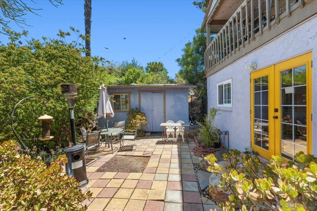 8621 Golf Drive Spring Valley, CA 91977 - Photo 41 of 41 a view of a house with backyard sitting area and garden