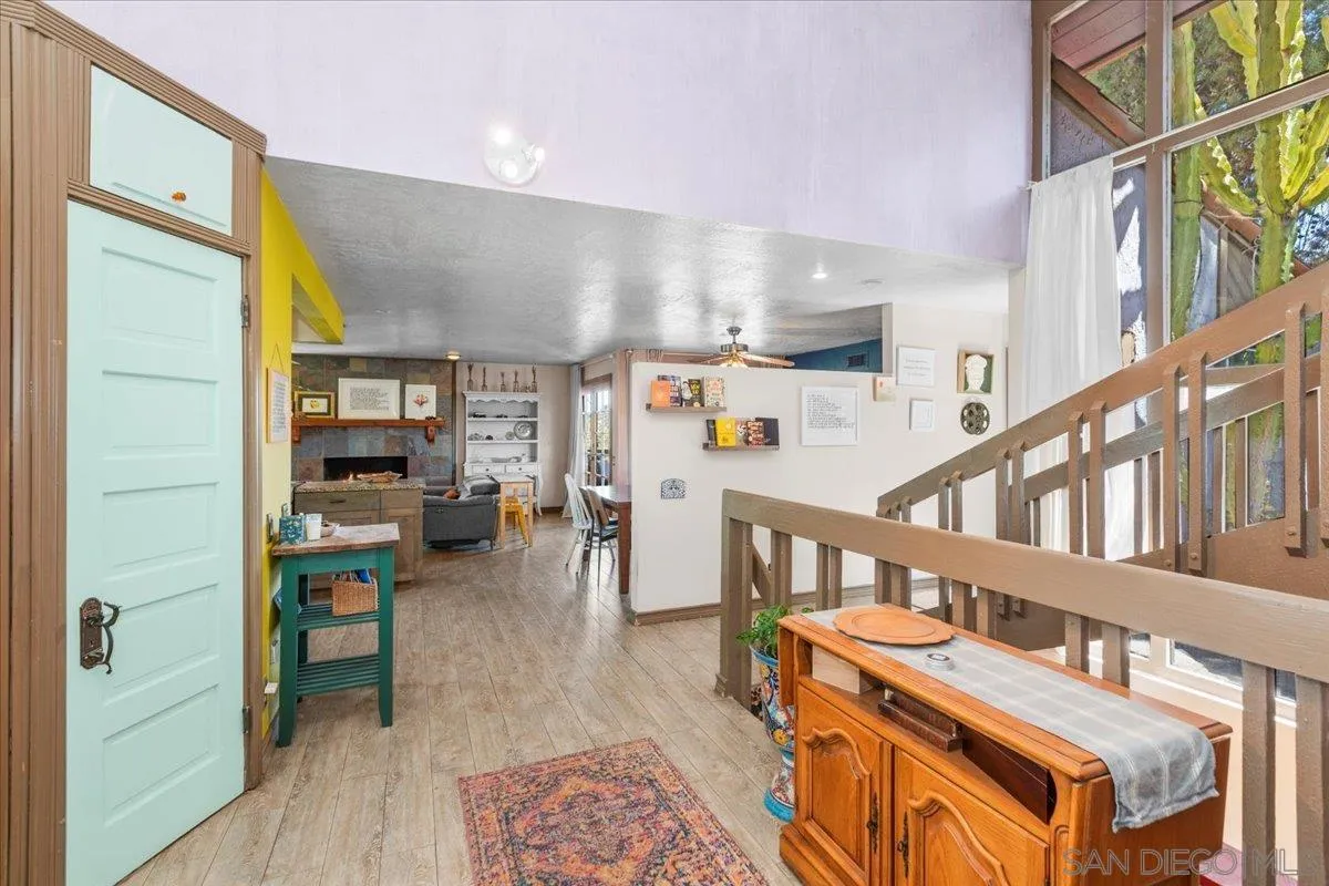 8621 Golf Drive Spring Valley, CA 91977 - Photo 6 of 41 a view of a livingroom with furniture and a book shelf