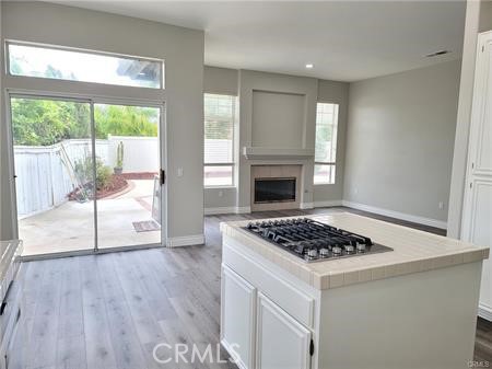 45617 Corte Montril Temecula, CA 92592 - Photo 14 of 50 a view of kitchen and sink with wooden floor