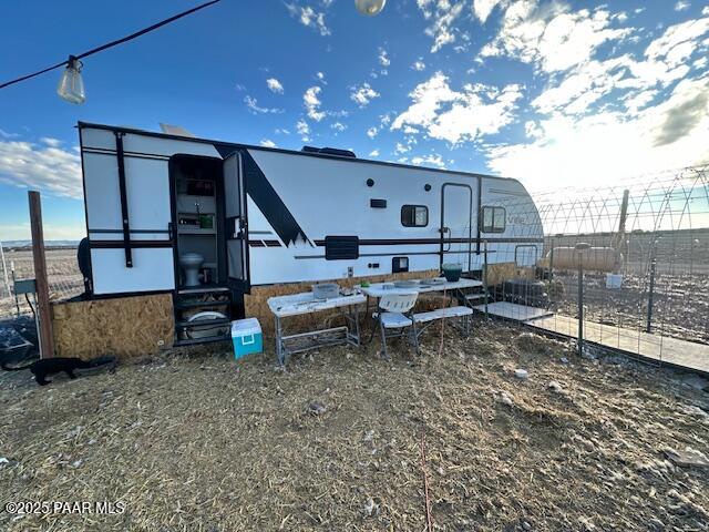 0 Triple H Ranch Road Ash Fork, AZ 86320 - Photo 3 of 46 a view of a house with backyard and sitting area