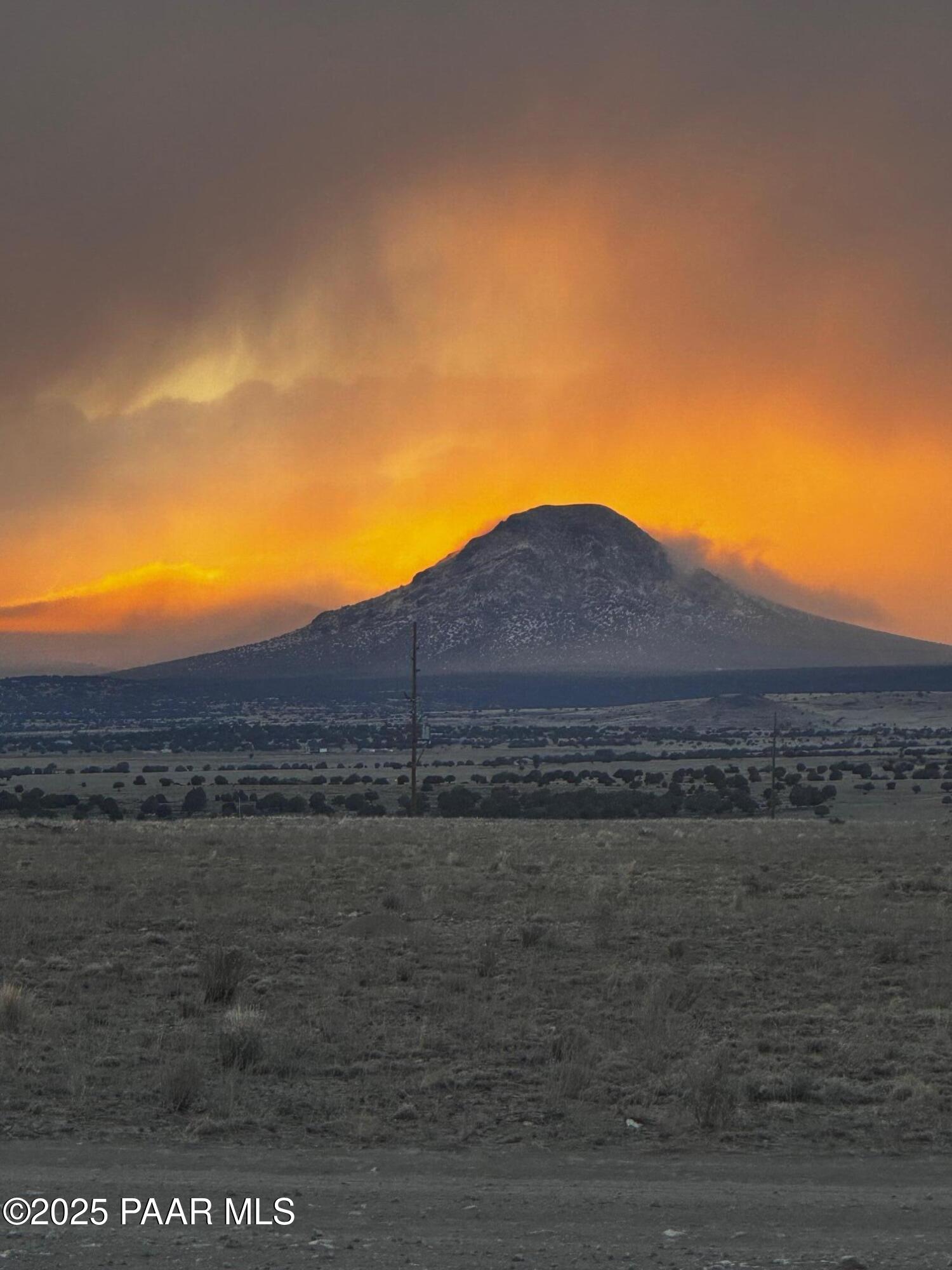 0 Triple H Ranch Road Ash Fork, AZ 86320 - Photo 39 of 46 a view of a lake with a mountain in the background