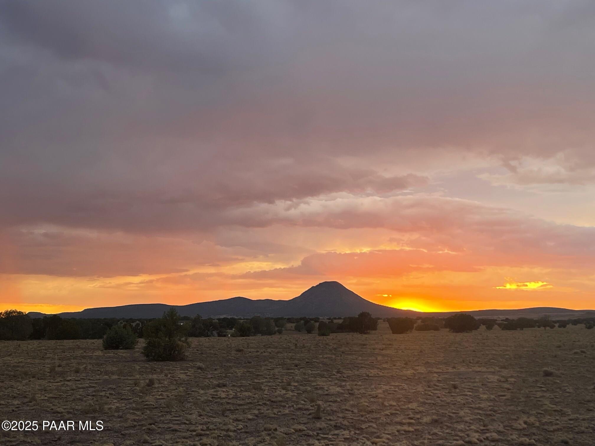 0 Triple H Ranch Road Ash Fork, AZ 86320 - Photo 40 of 46 a view of mountain and sunset