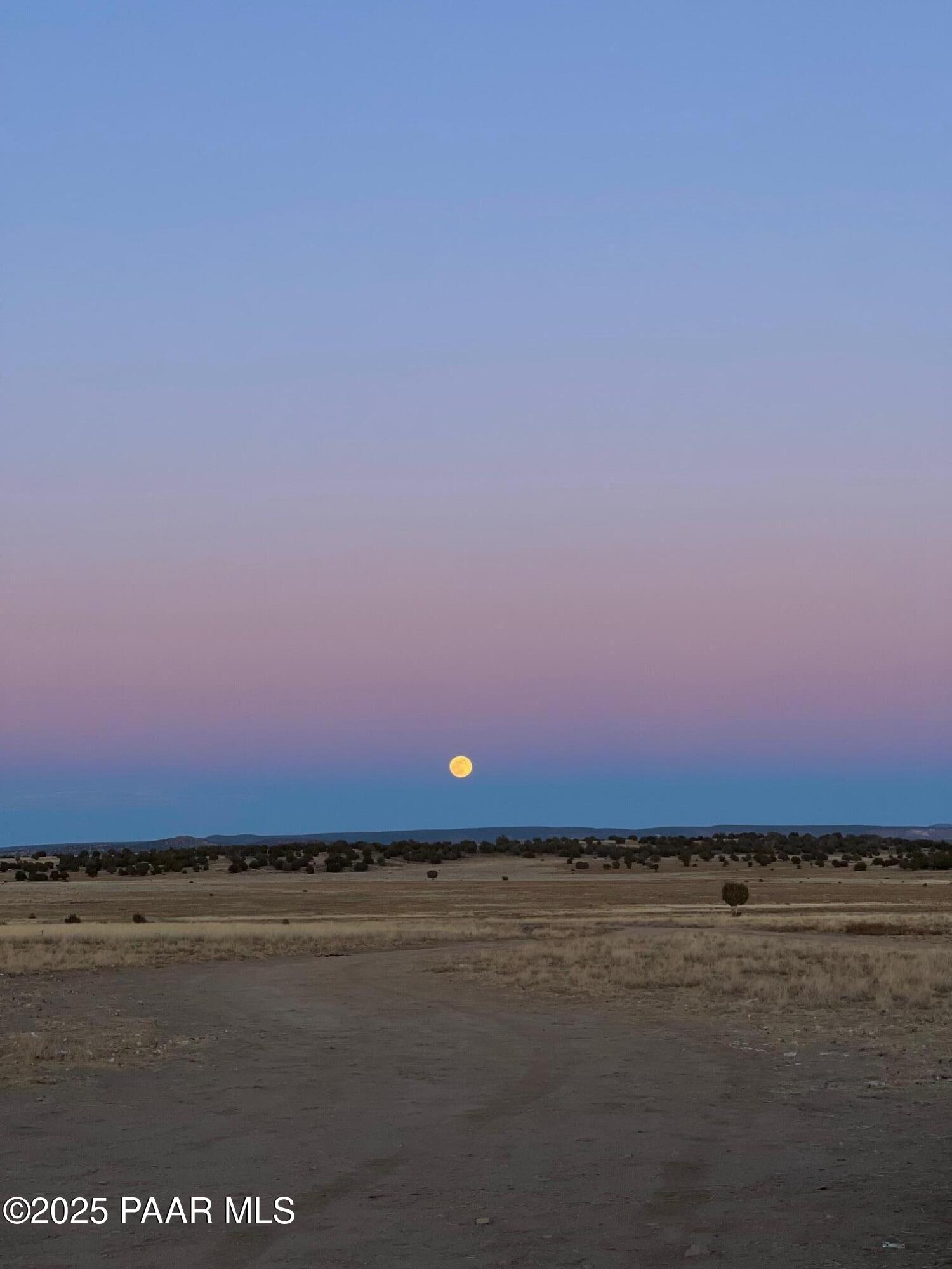 0 Triple H Ranch Road Ash Fork, AZ 86320 - Photo 41 of 46 a view of an ocean beach and city