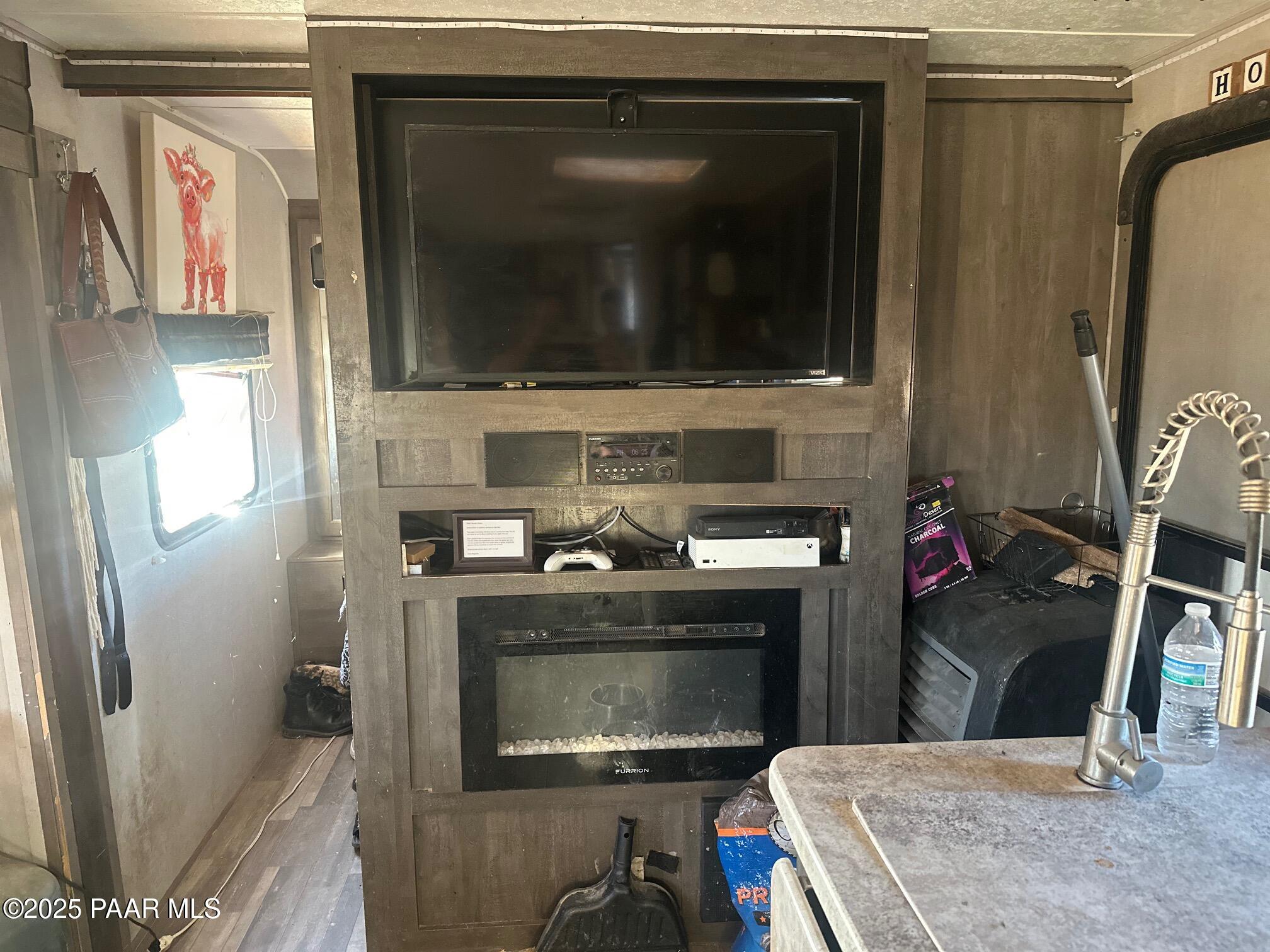 0 Triple H Ranch Road Ash Fork, AZ 86320 - Photo 10 of 46 a kitchen with a stove and a microwave