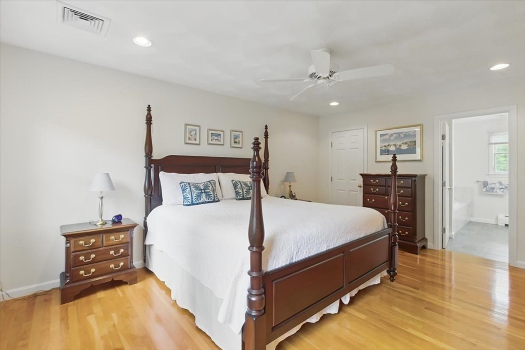 8 Valley Road Danvers, MA 01923 - Photo 23 of 41 a bed room with a bed and a tv