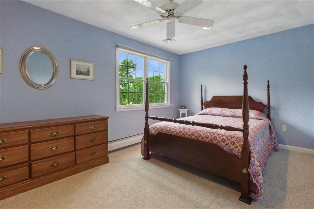 8 Valley Road Danvers, MA 01923 - Photo 27 of 41 a bedroom with a bed and a window