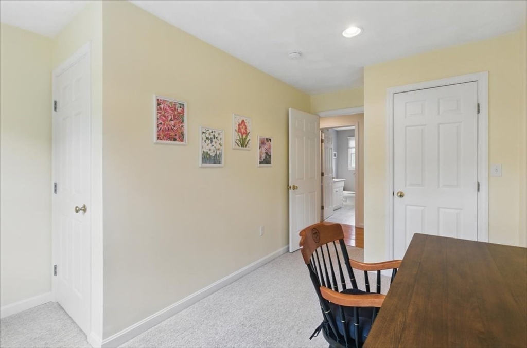 8 Valley Road Danvers, MA 01923 - Photo 31 of 41 a view of a hallway with seating area