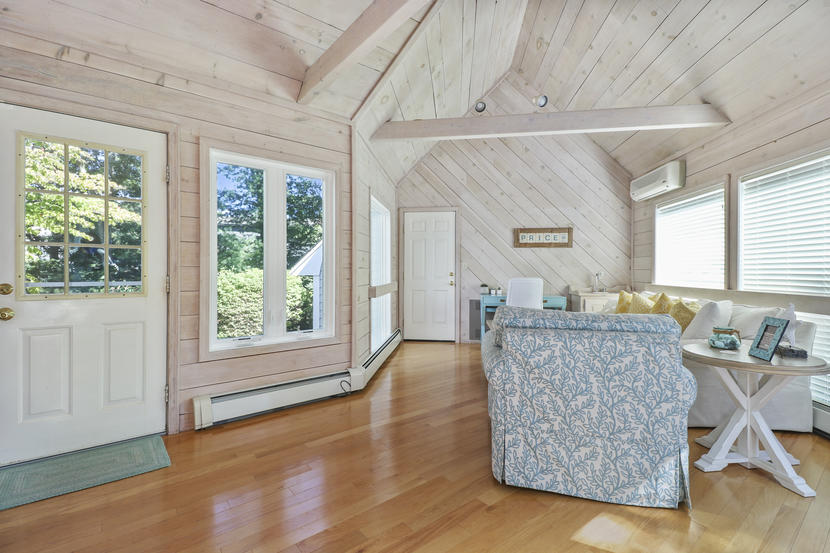 2 Samoset Road Mashpee, MA 02649 - Photo 13 of 41 a living room with furniture and a large window