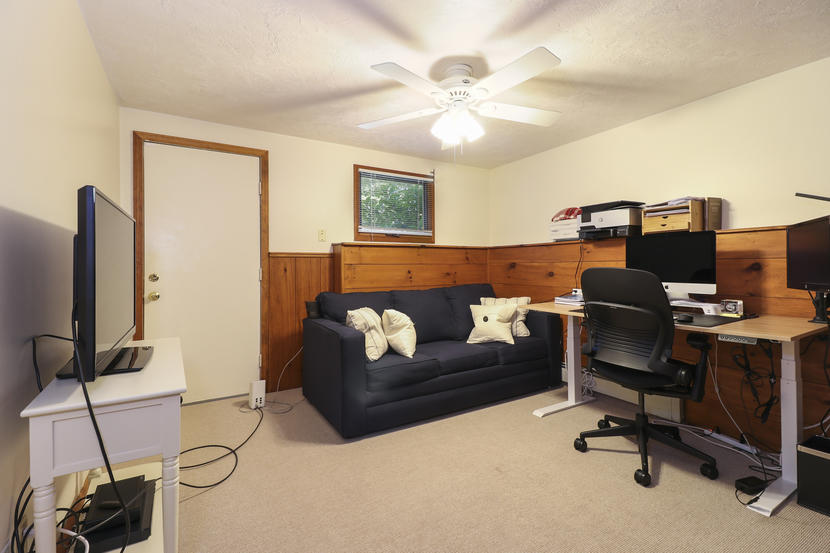 2 Samoset Road Mashpee, MA 02649 - Photo 19 of 41 a view of a livingroom with workspace and a couch