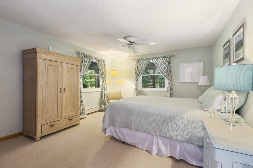 2 Samoset Road Mashpee, MA 02649 - Photo 20 of 41 a bedroom with a large bed and a window