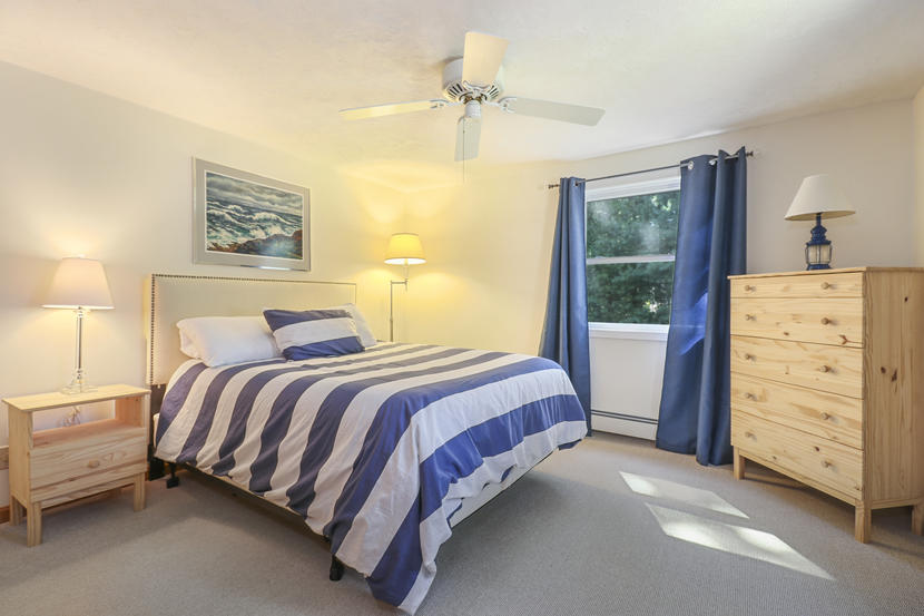 2 Samoset Road Mashpee, MA 02649 - Photo 25 of 41 a spacious bedroom with a bed and a window