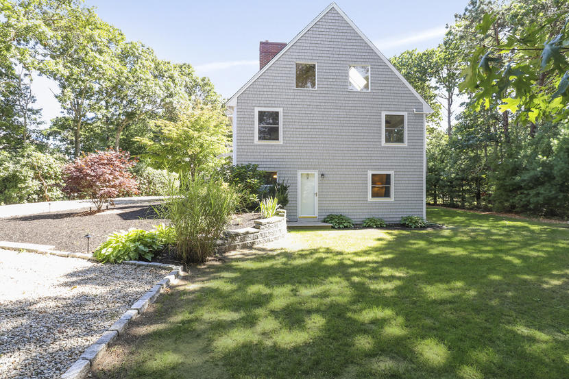 2 Samoset Road Mashpee, MA 02649 - Photo 31 of 41 a bathroom with a sink and garden