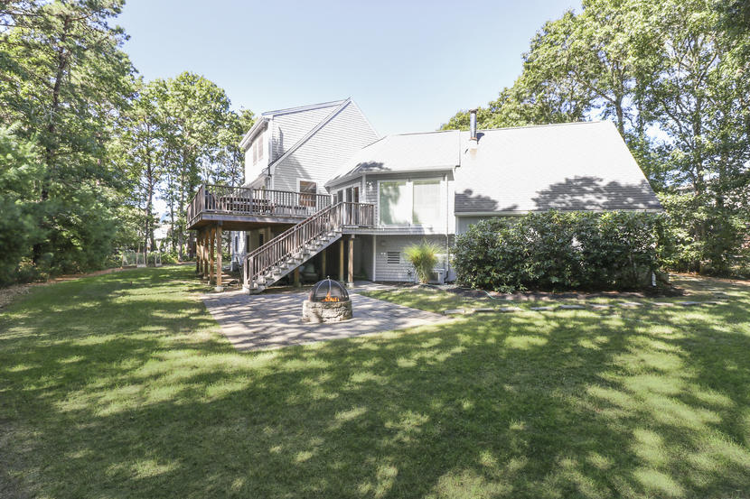 2 Samoset Road Mashpee, MA 02649 - Photo 32 of 41 a view of a house with a yard