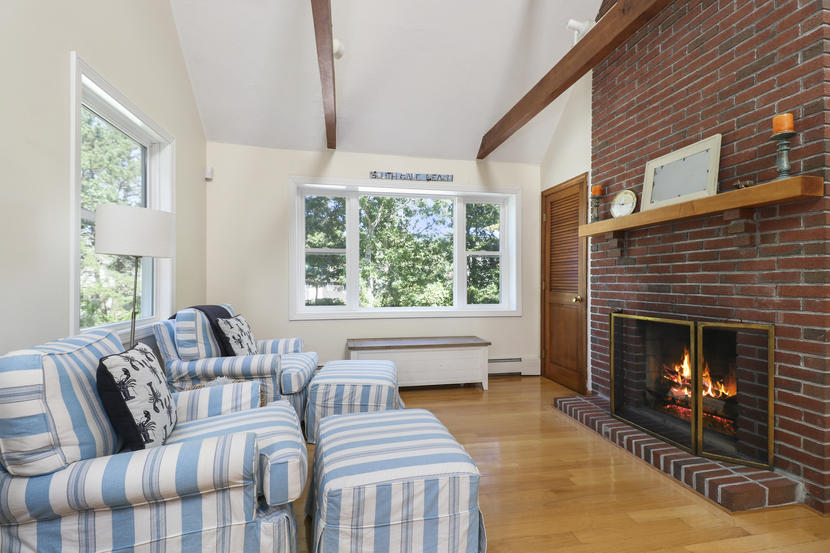 2 Samoset Road Mashpee, MA 02649 - Photo 5 of 41 a living room with furniture and a fireplace