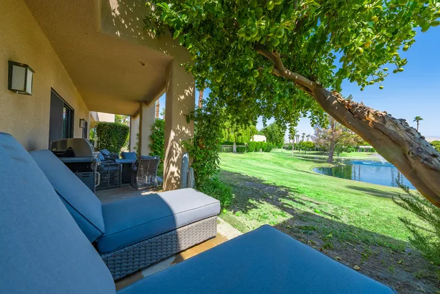 a view of a couches in the backyard