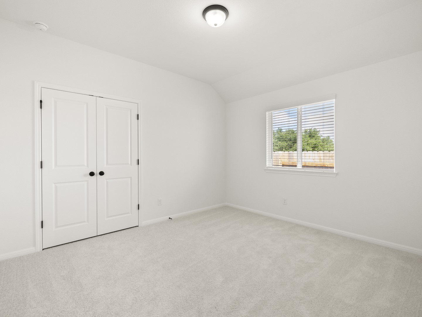 402 Judson Street Bertram, TX 78605 - Photo 18 of 27 an empty room with windows