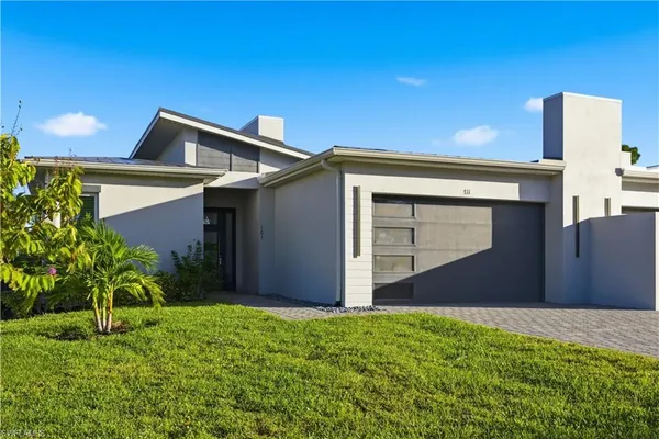 a backyard of a house with lots of green space