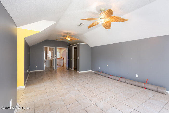 8092 Collins Road Jacksonville, FL 32244 - Photo 25 of 42 a view of an empty room with a window