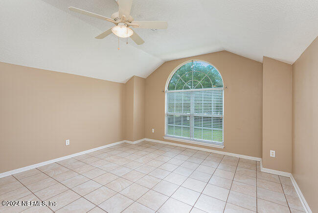 8092 Collins Road Jacksonville, FL 32244 - Photo 26 of 42 a view of an empty room with a window