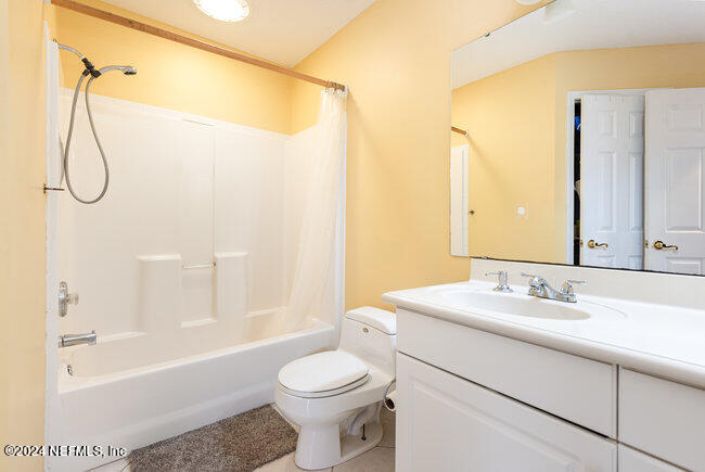8092 Collins Road Jacksonville, FL 32244 - Photo 29 of 42 a bathroom with a sink toilet and shower