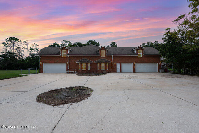 8092 Collins Road Jacksonville, FL 32244 - Photo 36 of 42 front view of a house with a yard