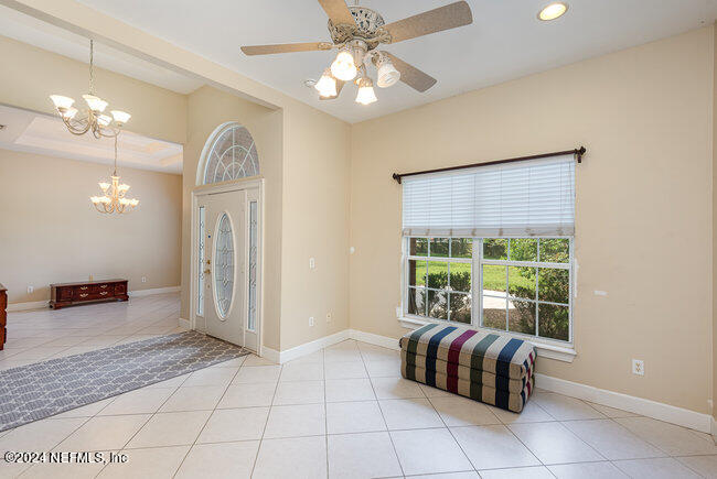 8092 Collins Road Jacksonville, FL 32244 - Photo 4 of 42 a living room with furniture and a large window