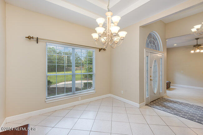 8092 Collins Road Jacksonville, FL 32244 - Photo 6 of 42 a view of an empty room with a window