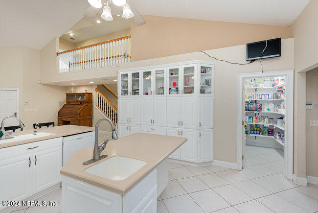 8092 Collins Road Jacksonville, FL 32244 - Photo 9 of 42 a bathroom with a sink double vanity and a mirror