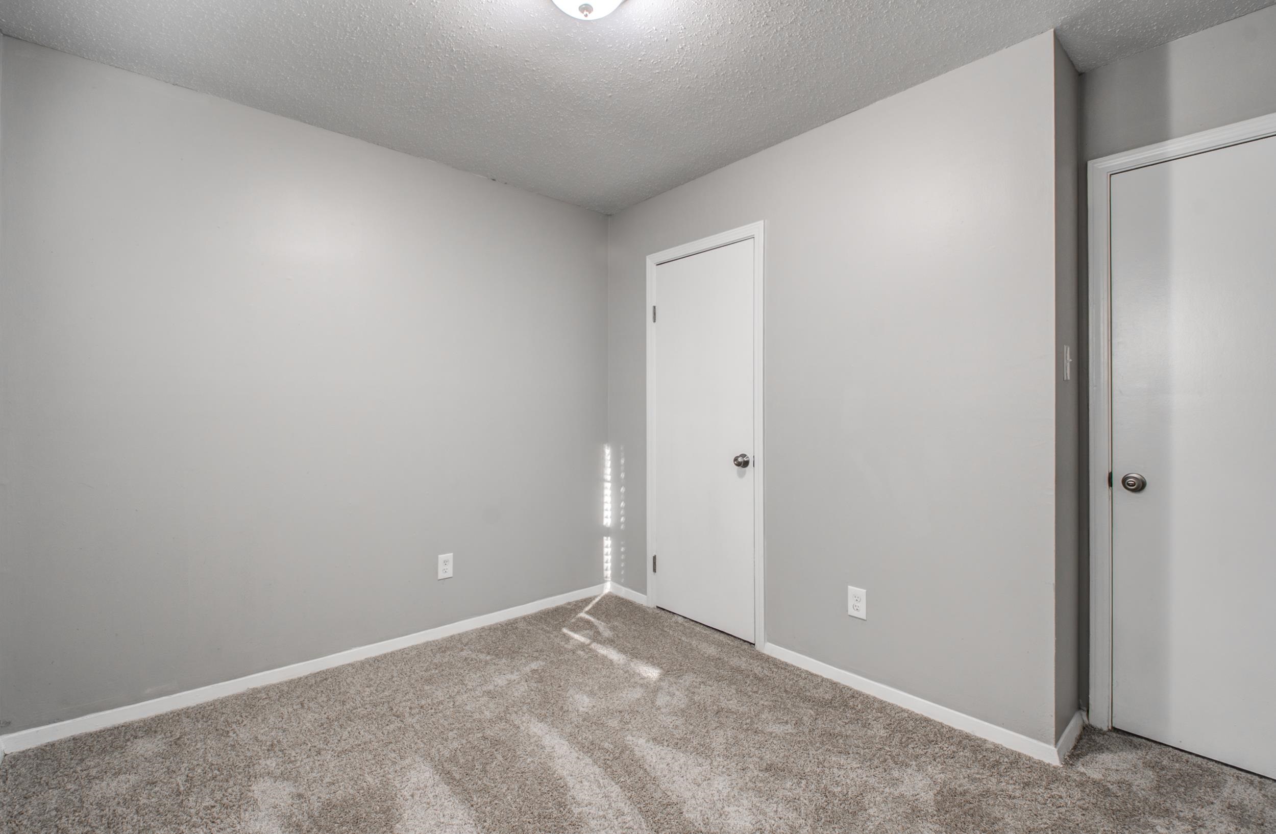 4174 Hobson Road Memphis, TN 38128 - Photo 18 of 24 Unfurnished bedroom featuring a textured ceiling and carpet