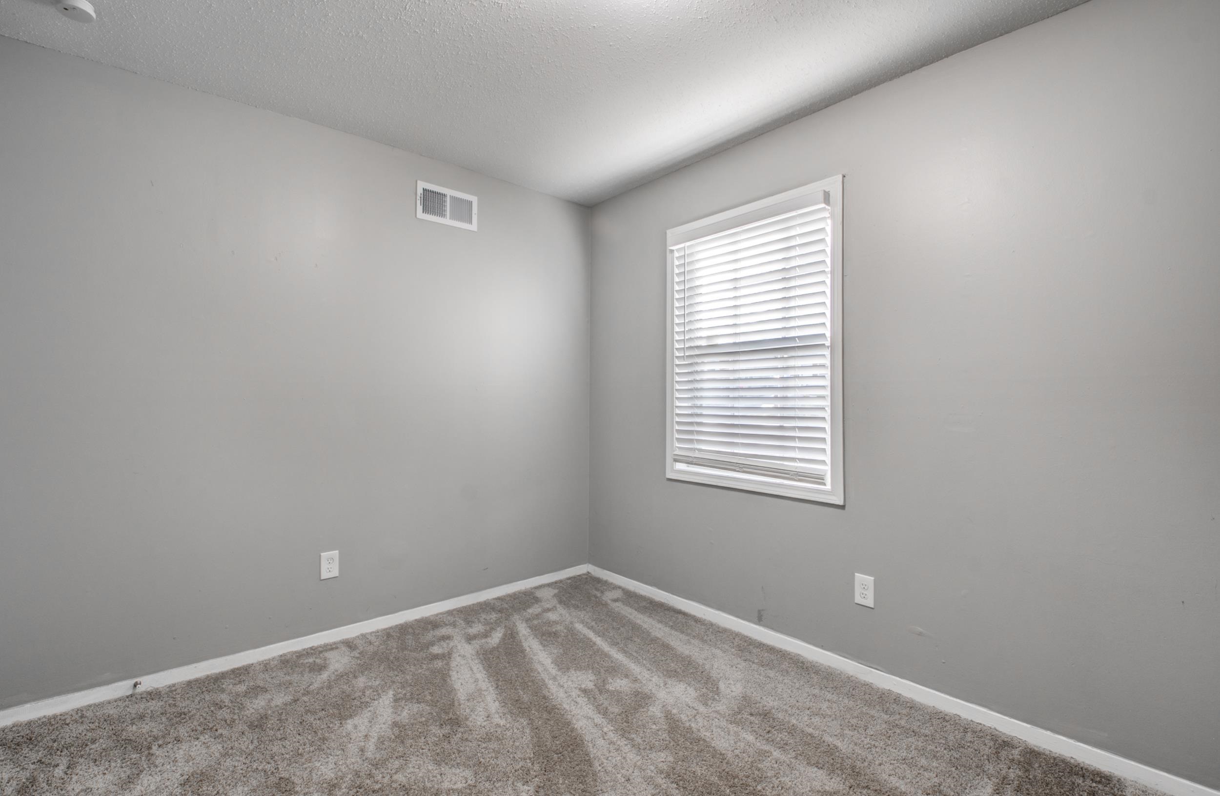 4174 Hobson Road Memphis, TN 38128 - Photo 19 of 24 Carpeted empty room with a textured ceiling and baseboards