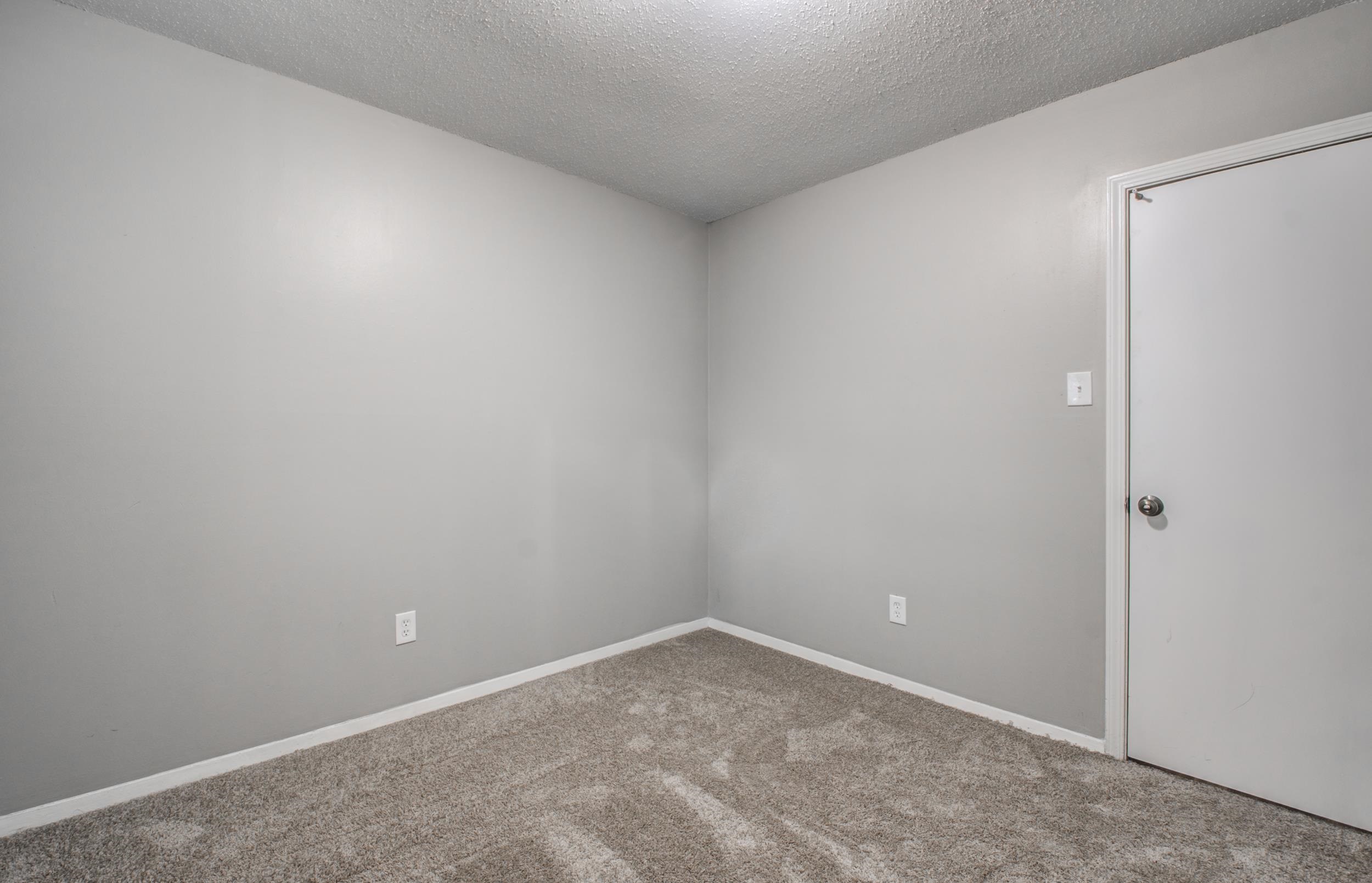 4174 Hobson Road Memphis, TN 38128 - Photo 21 of 24 Carpeted spare room featuring a textured ceiling and baseboards
