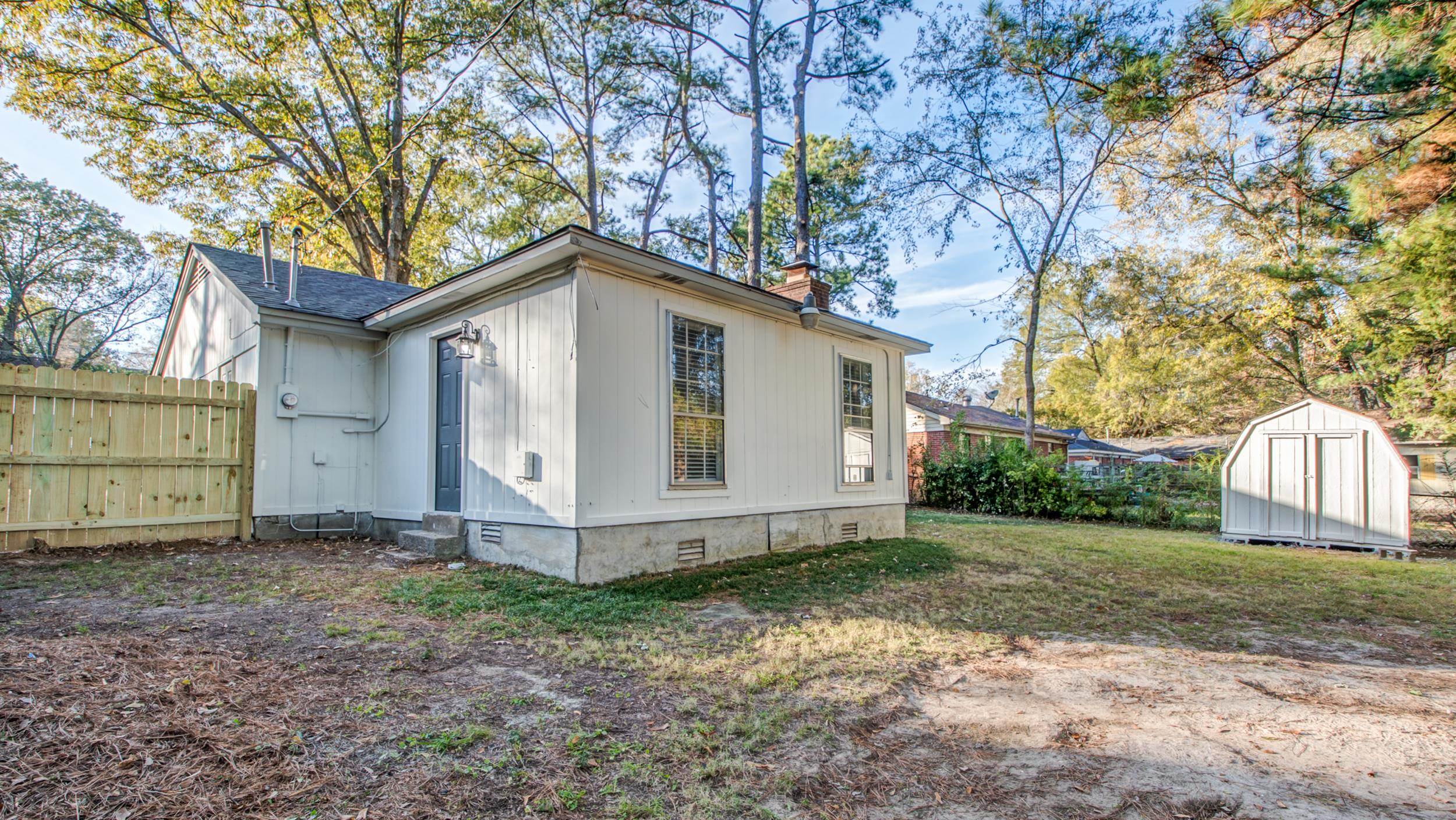 4174 Hobson Road Memphis, TN 38128 - Photo 24 of 24 View of side of home with crawl space, a shed, and a chimney